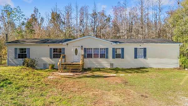 1.63 Acres of Residential Land with Home for Sale in Lakeland, Florida