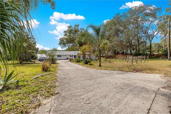 2.1 Acres of Residential Land with Home for Sale in Fruitland Park, Florida