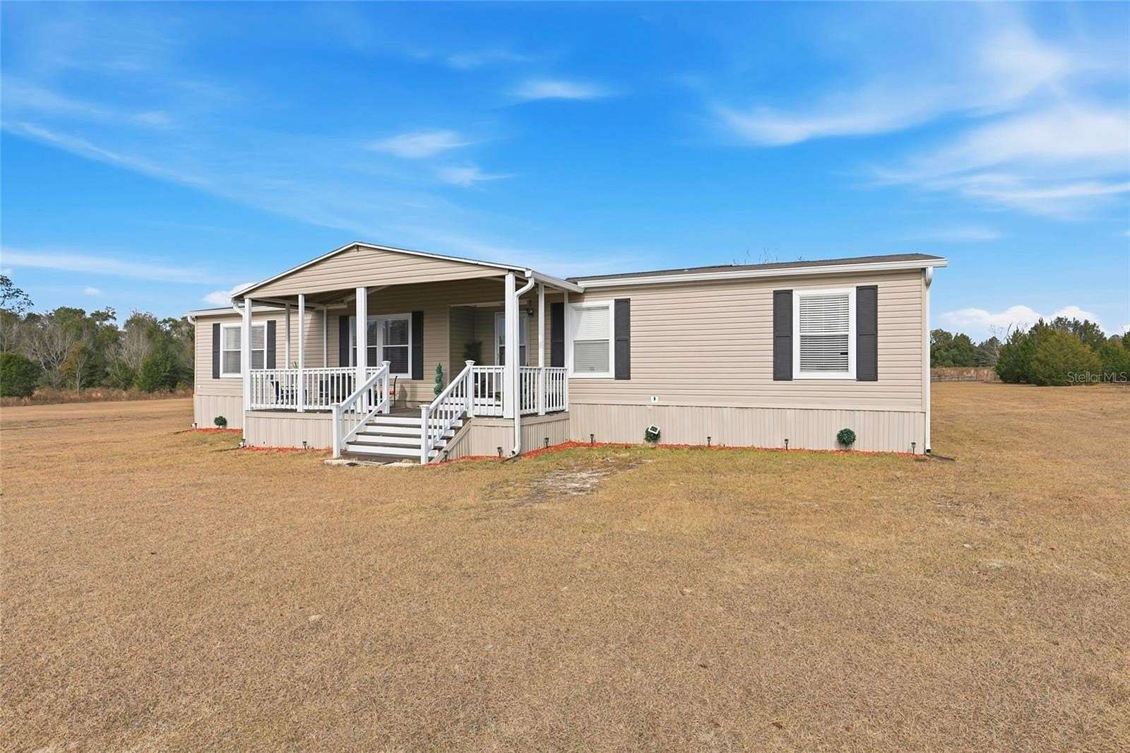 5 Acres of Residential Land with Home for Sale in Lake City, Florida