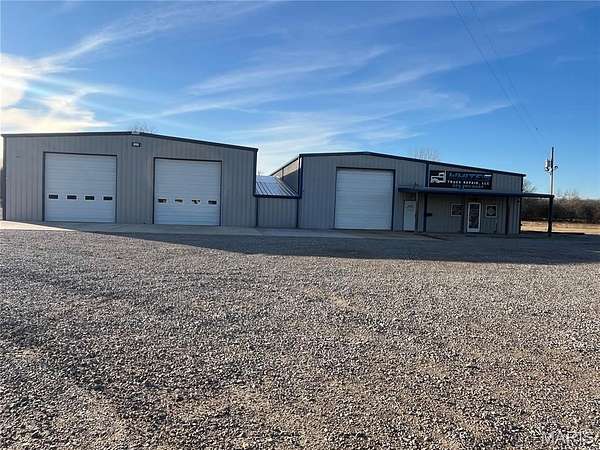 6.89 Acres of Improved Commercial Land for Sale in Neelyville, Missouri