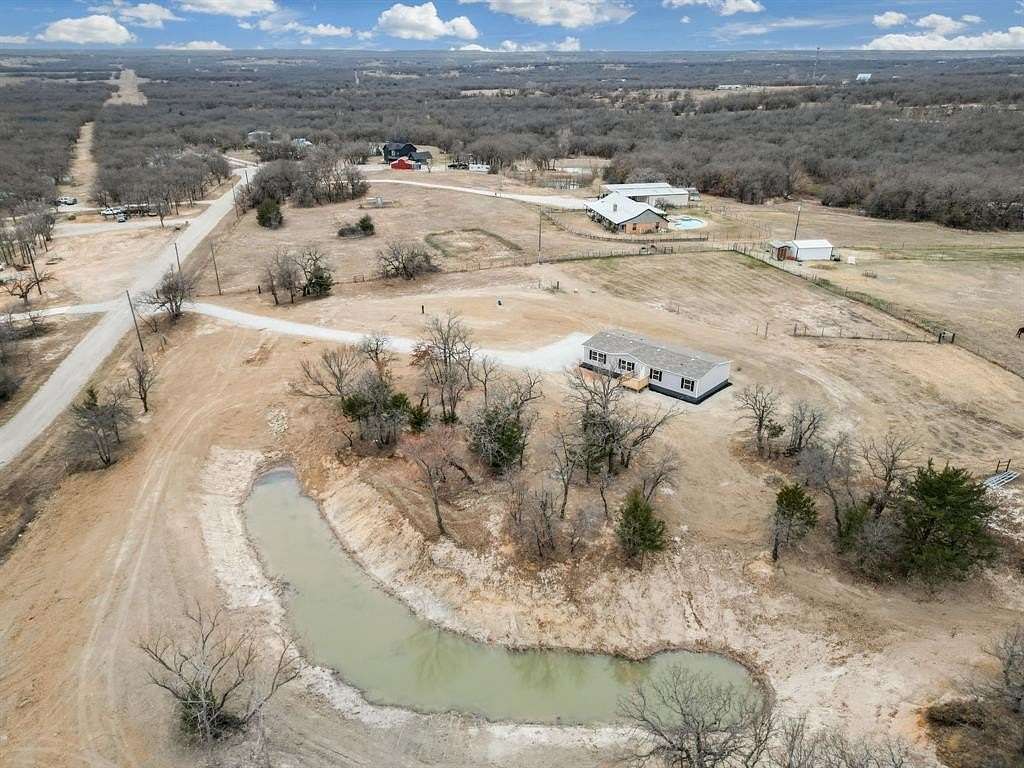3 Acres of Residential Land with Home for Sale in Paradise, Texas