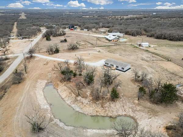 3 Acres of Residential Land with Home for Sale in Paradise, Texas