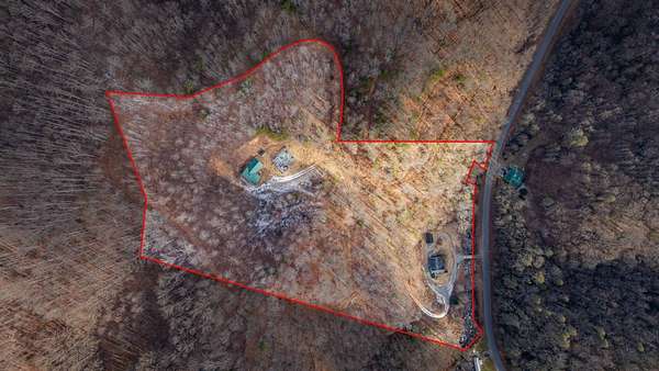 13.4 Acres of Recreational Land with Home for Auction in Roan Mountain, Tennessee