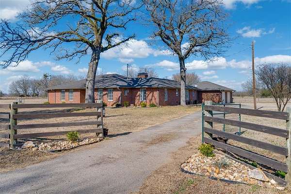 6.46 Acres of Land with Home for Sale in Arthur City, Texas