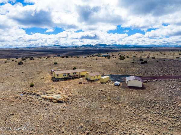 5 Acres of Residential Land with Home for Sale in Concho, Arizona