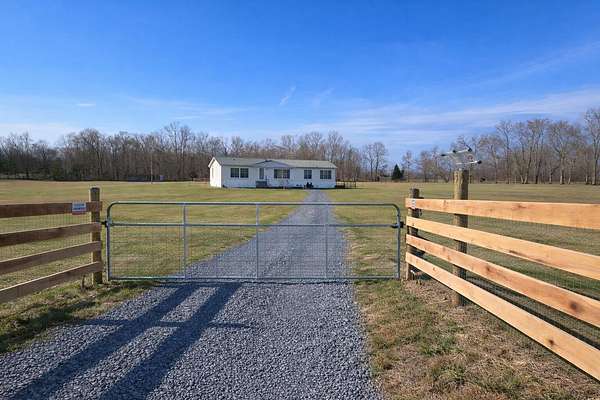21 Acres of Land with Home for Sale in Columbia, Kentucky