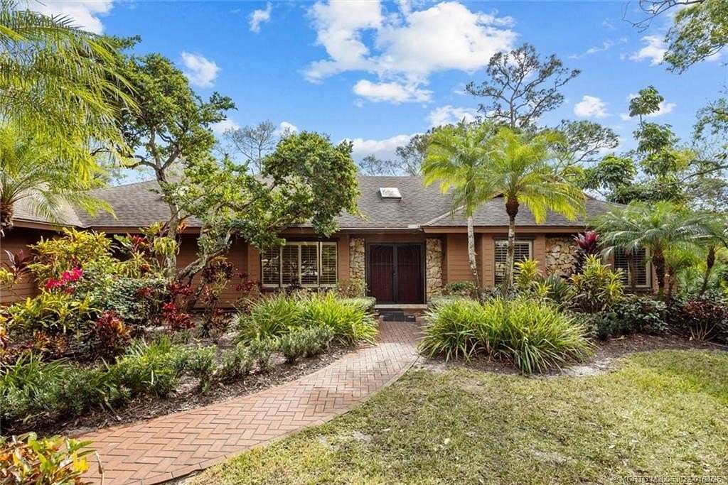 1.81 Acres of Residential Land with Home for Sale in Palm City, Florida