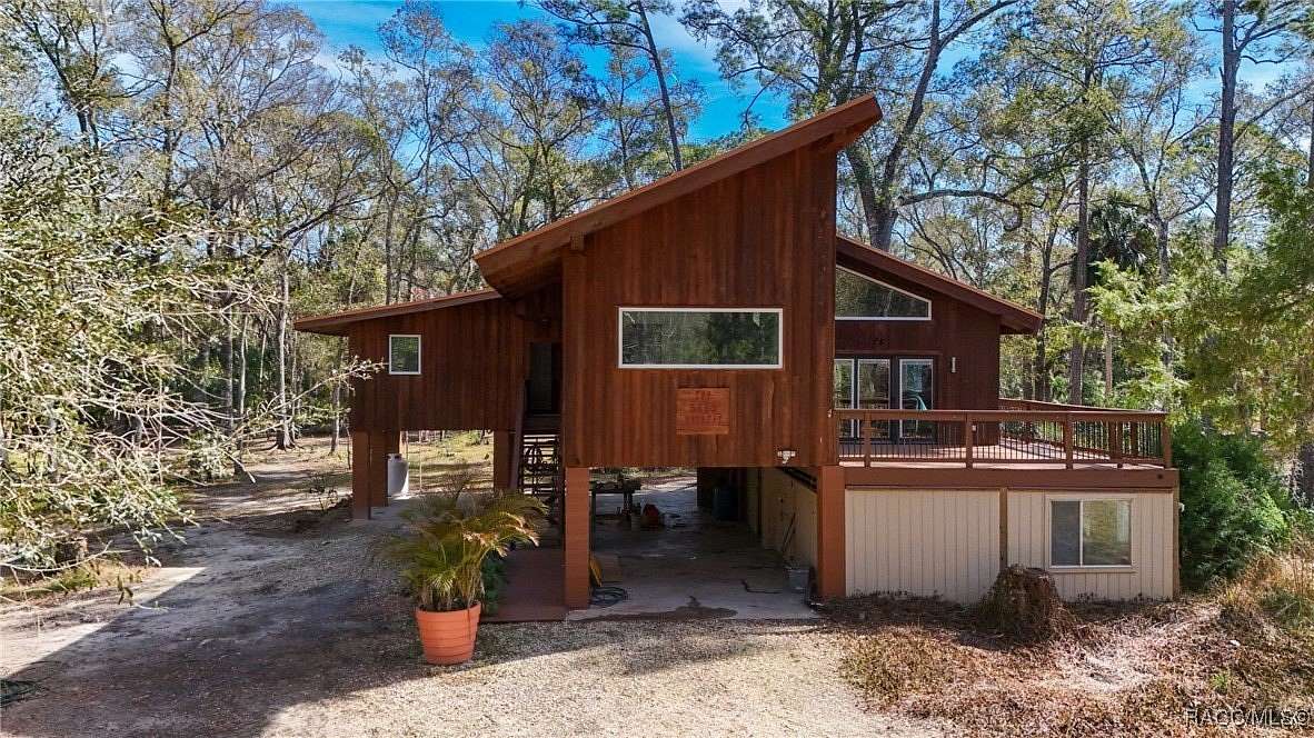 6.53 Acres of Land with Home for Sale in Yankeetown, Florida