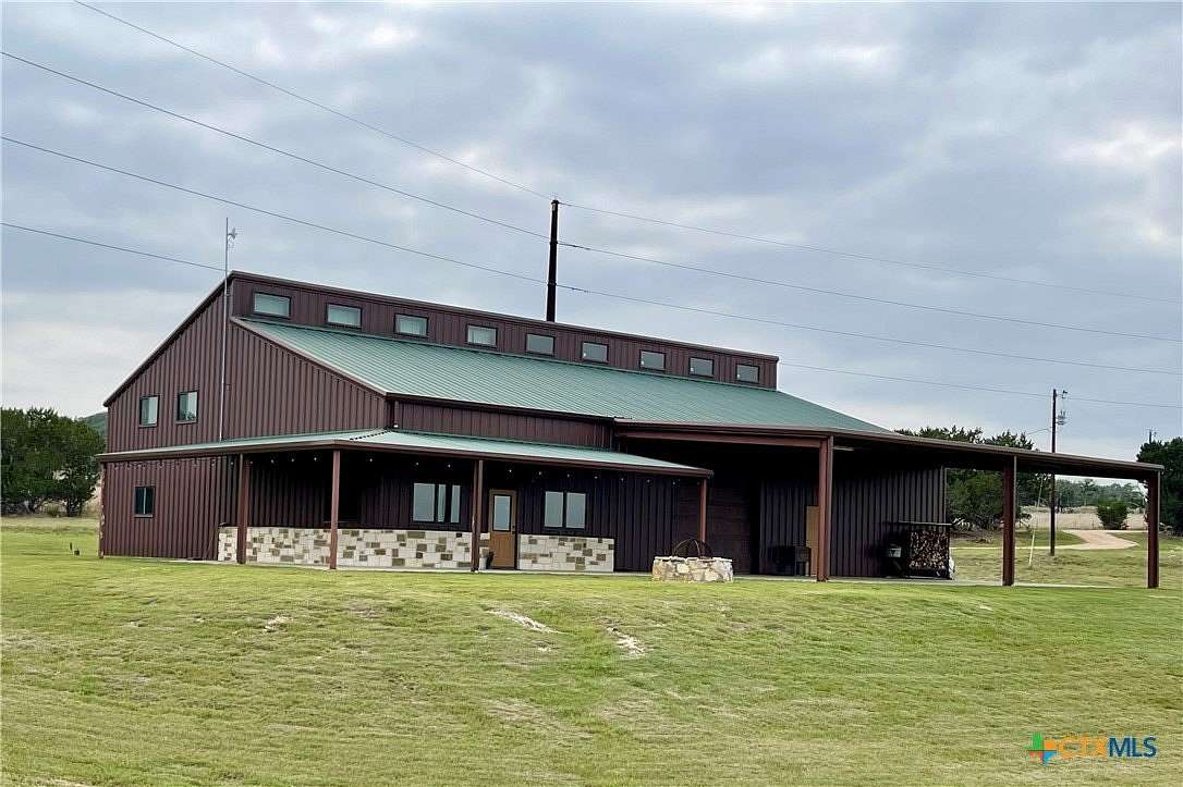 56.3 Acres of Recreational Land with Home for Sale in Stonewall, Texas