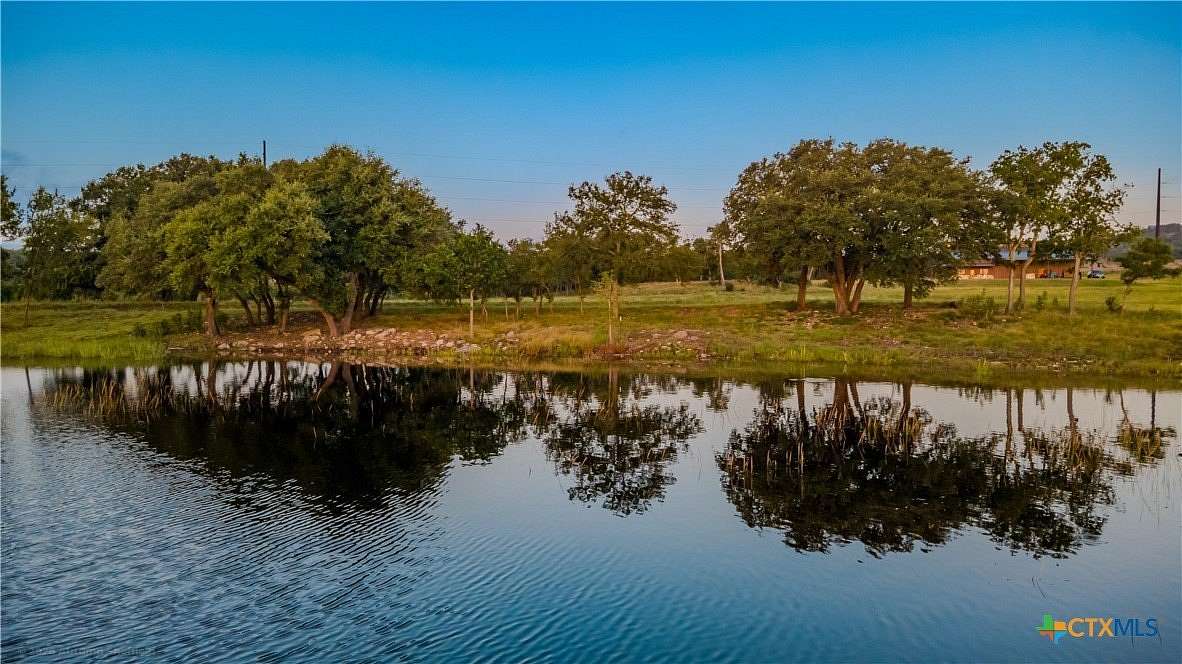 56.3 Acres of Recreational Land with Home for Sale in Stonewall, Texas
