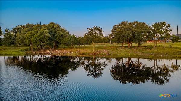 56.3 Acres of Recreational Land with Home for Sale in Stonewall, Texas