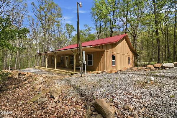 10.9 Acres of Land with Home for Sale in Seymour, Tennessee