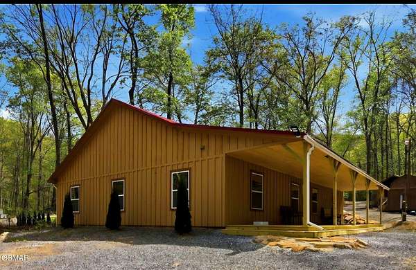 10.9 Acres of Land with Home for Sale in Seymour, Tennessee