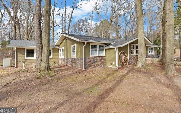 21.4 Acres of Land with Home for Sale in Royston, Georgia