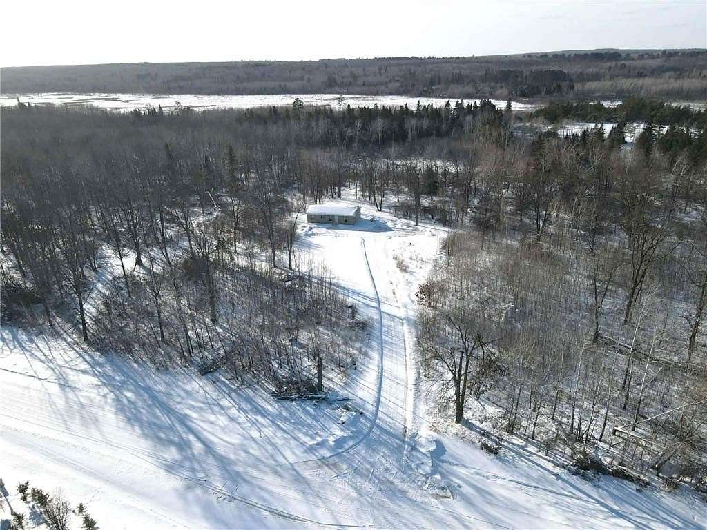 9 Acres of Land with Home for Sale in Solway, Minnesota