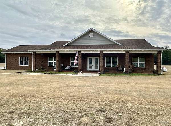 5 Acres of Residential Land with Home for Sale in Milton, Florida