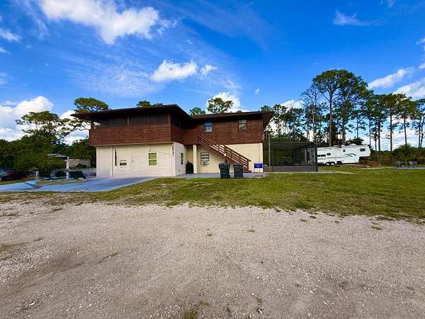 2.36 Acres of Residential Land with Home for Lease in Loxahatchee Groves, Florida