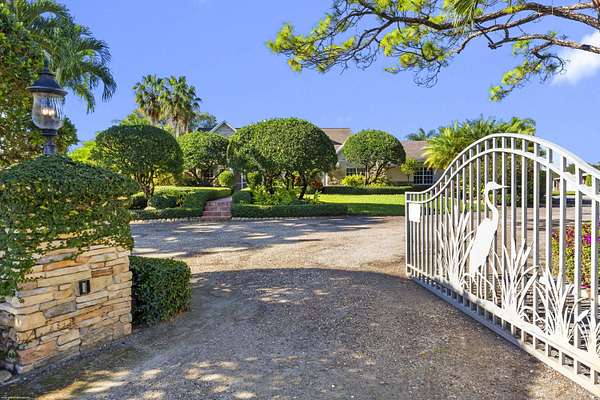 5 Acres of Residential Land with Home for Sale in Wellington, Florida