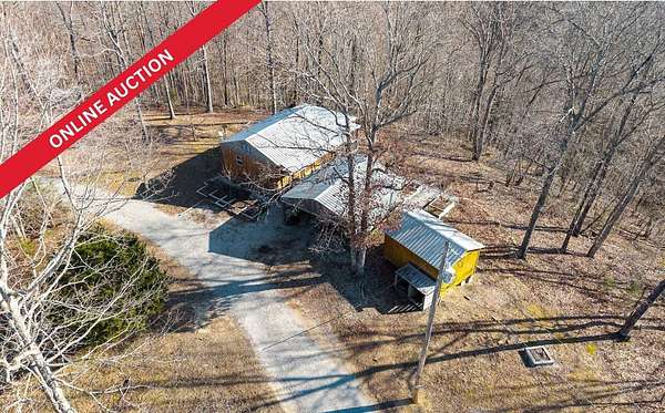 5.3 Acres of Residential Land with Home for Sale in Celina, Tennessee