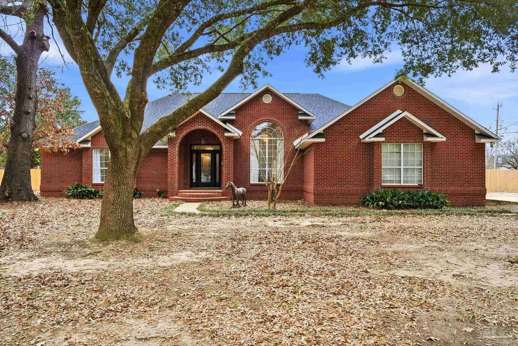 1.8 Acres of Land with Home for Sale in Pace, Florida