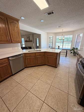 1.8 Acres of Land with Home for Sale in Pace, Florida