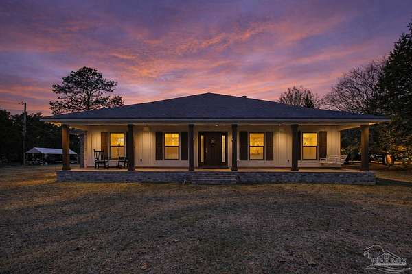 1.5 Acres of Residential Land with Home for Sale in Century, Florida