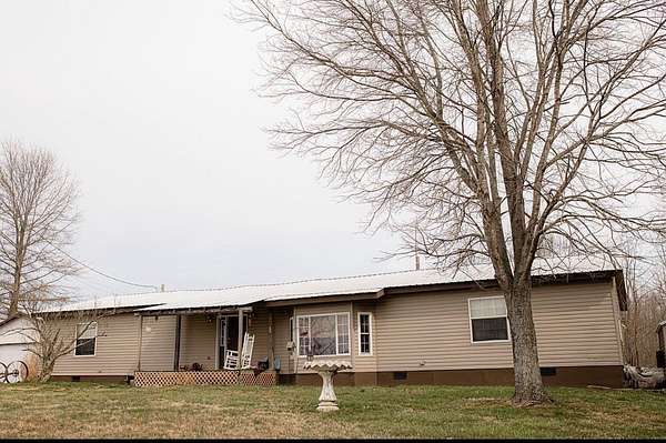 7.5 Acres of Residential Land with Home for Sale in Campbellsville, Kentucky