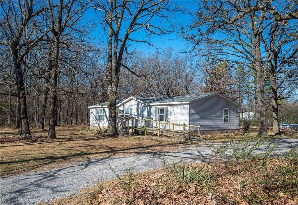 7 Acres of Residential Land with Home for Sale in Gentry, Arkansas