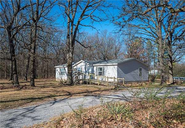 7 Acres of Residential Land with Home for Sale in Gentry, Arkansas