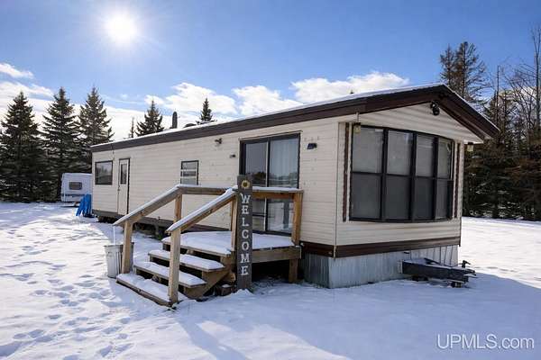 2 Acres of Residential Land with Home for Sale in Cornell, Michigan