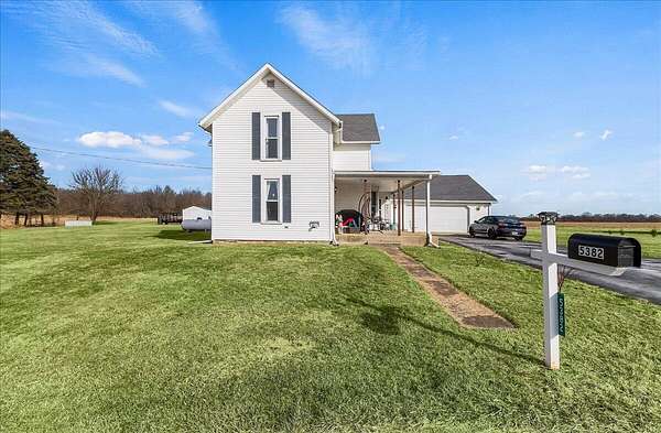 1.5 Acres of Residential Land with Home for Sale in West Liberty, Ohio