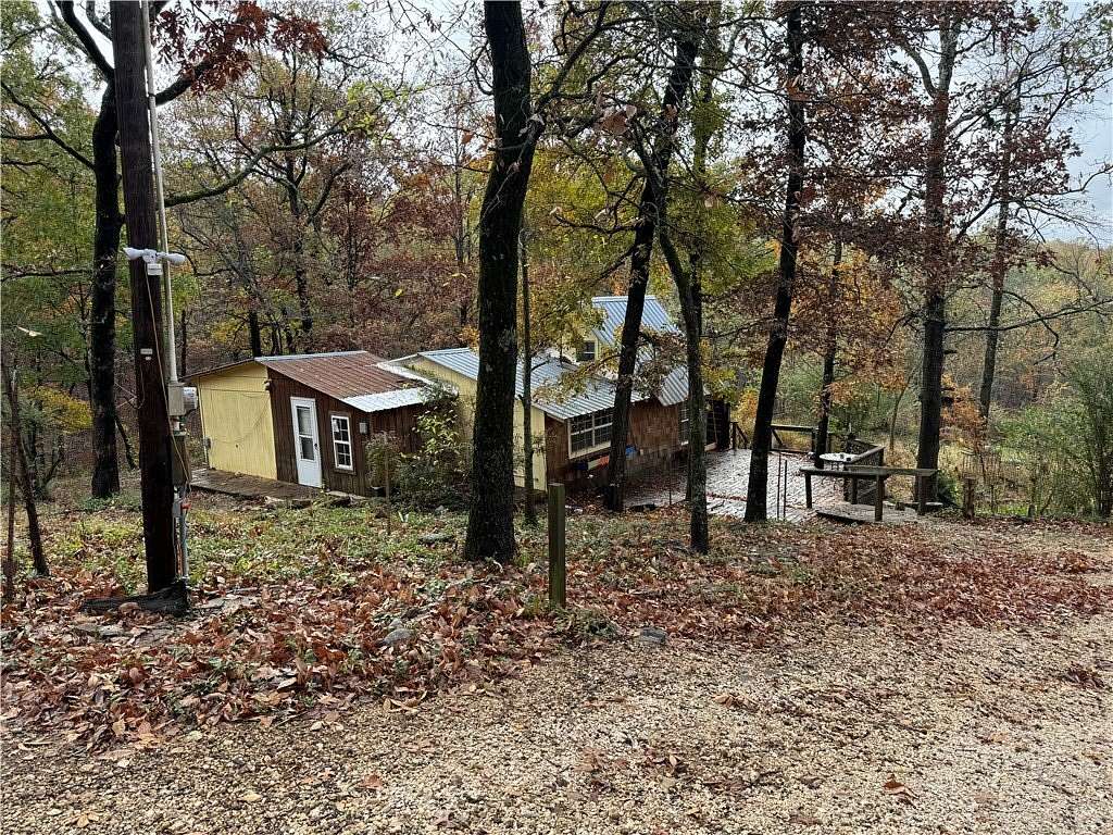 9.76 Acres of Land with Home for Sale in Canehill, Arkansas