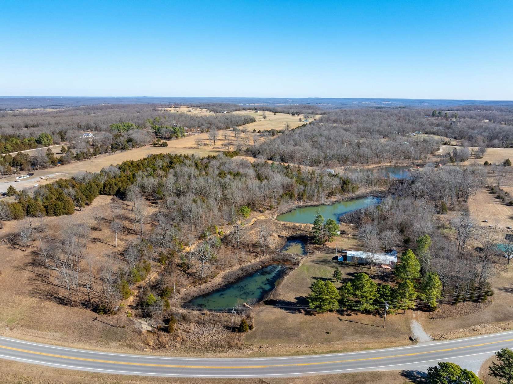 9 Acres of Land with Home for Sale in Ash Flat, Arkansas