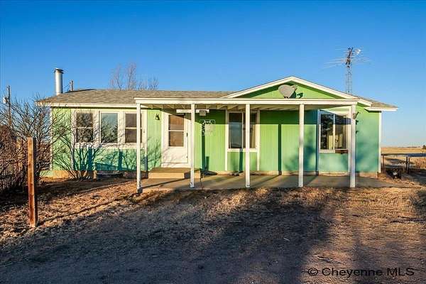 10.3 Acres of Land with Home for Sale in Burns, Wyoming