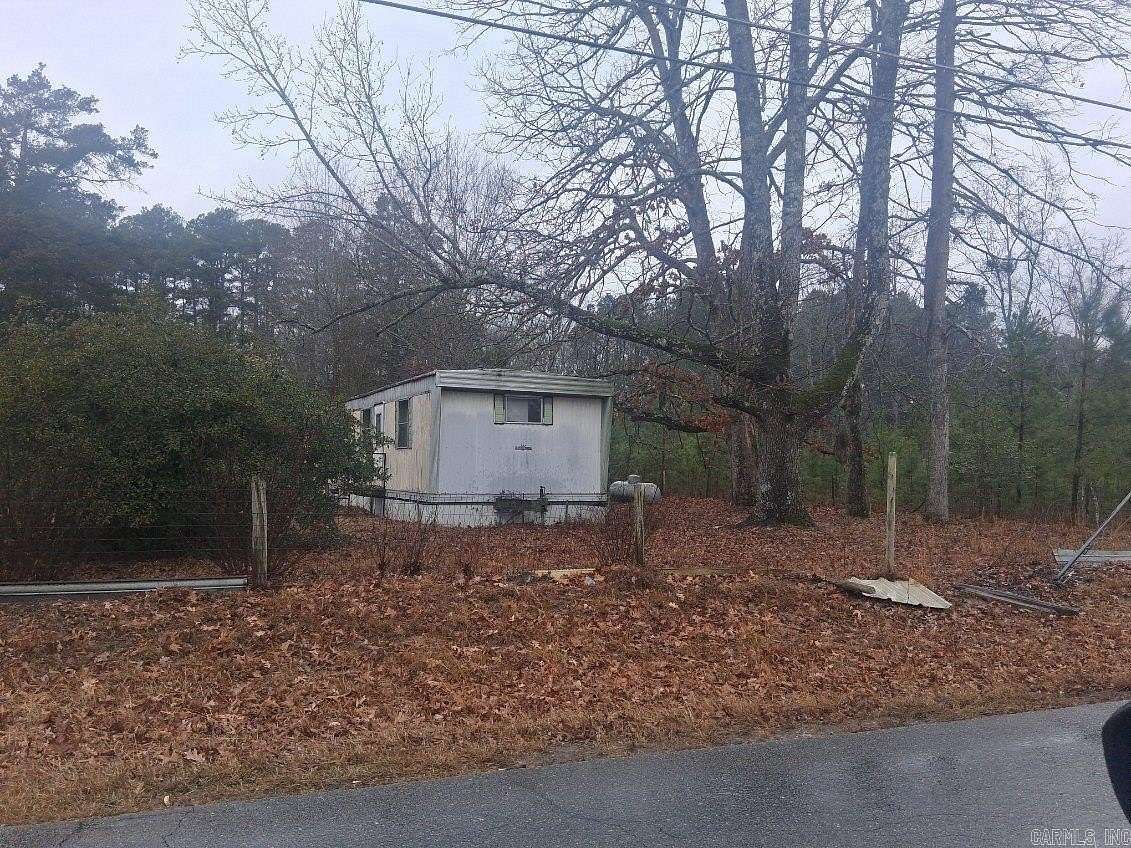 5 Acres of Residential Land with Home for Sale in White Hall, Arkansas