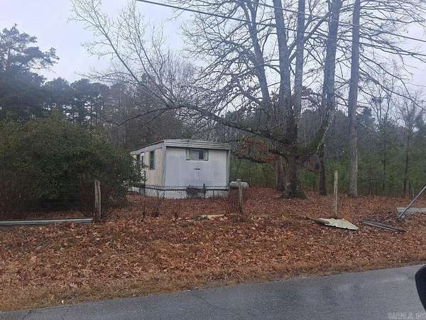 5 Acres of Residential Land with Home for Sale in White Hall, Arkansas