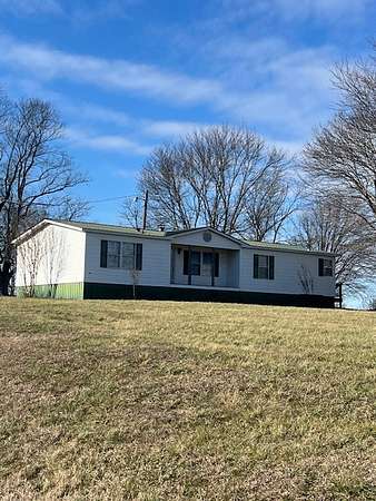 1.8 Acres of Residential Land with Home for Auction in Portland, Tennessee
