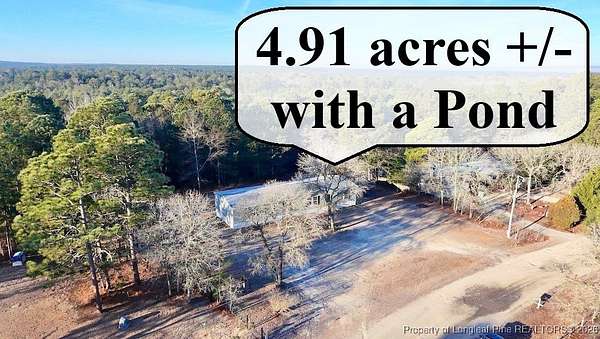 5 Acres of Residential Land with Home for Sale in Vass, North Carolina