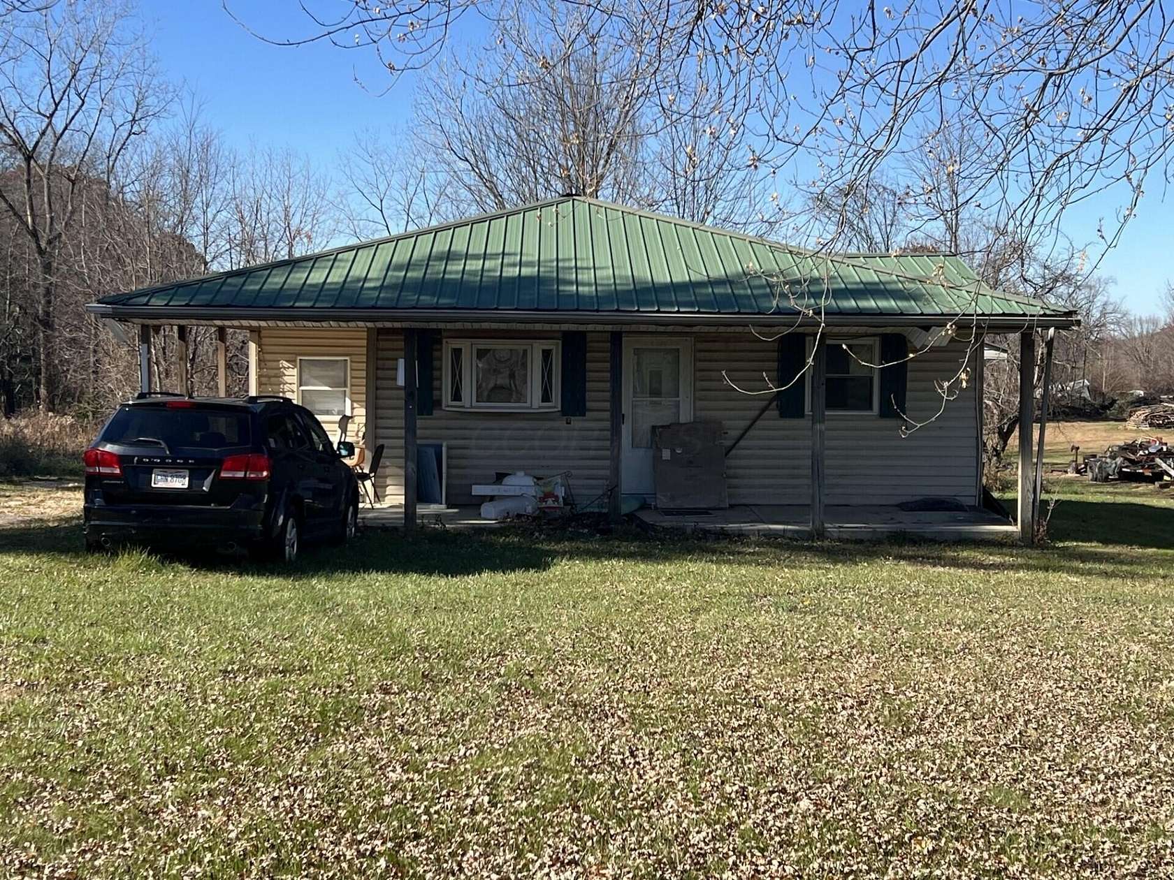 10.4 Acres of Recreational Land with Home for Sale in Marengo, Ohio