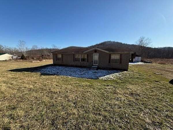 4.22 Acres of Residential Land with Home for Sale in Piketon, Ohio