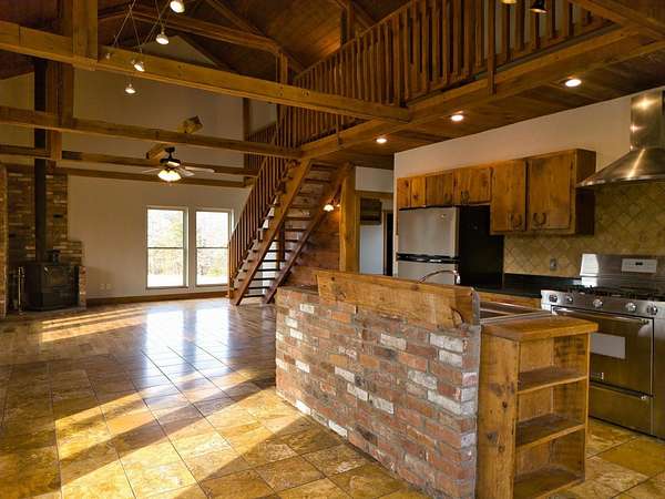 20 Acres of Agricultural Land with Home for Sale in Highlandville, Missouri