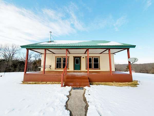 20 Acres of Agricultural Land with Home for Sale in Highlandville, Missouri