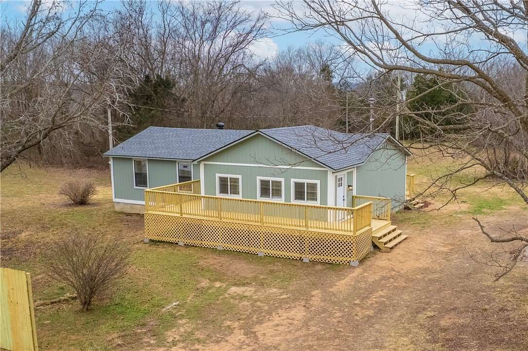 4.8 Acres of Land with Home for Sale in Elkins, Arkansas