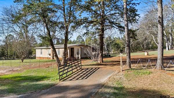 5 Acres of Residential Land with Home for Sale in Mount Enterprise, Texas