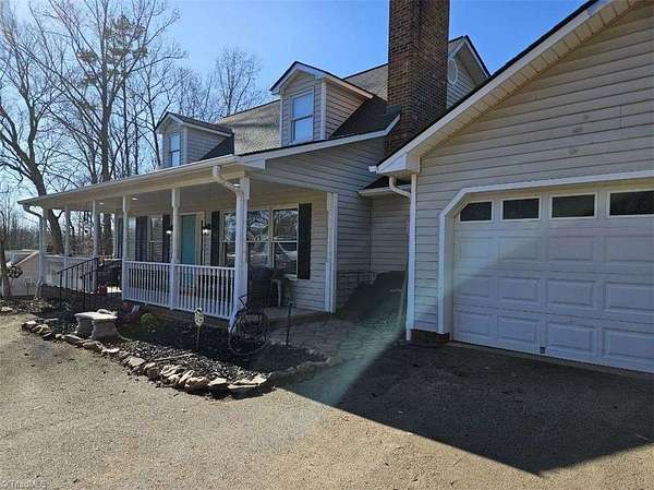 20.7 Acres of Land with Home for Sale in Dobson, North Carolina