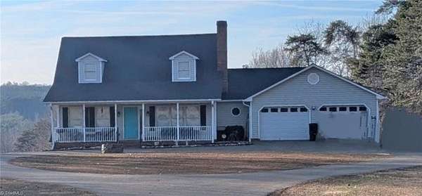 20.7 Acres of Land with Home for Sale in Dobson, North Carolina