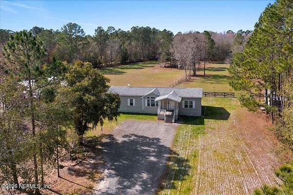 4.87 Acres of Residential Land with Home for Sale in Middleburg, Florida