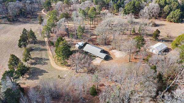 32.6 Acres of Land with Home for Sale in Douglassville, Texas