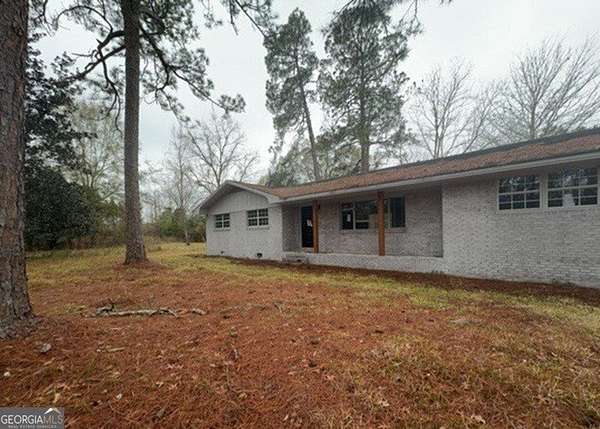 5 Acres of Residential Land with Home for Auction in Adel, Georgia