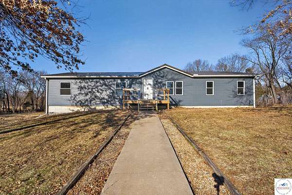 5 Acres of Residential Land with Home for Sale in Otterville, Missouri